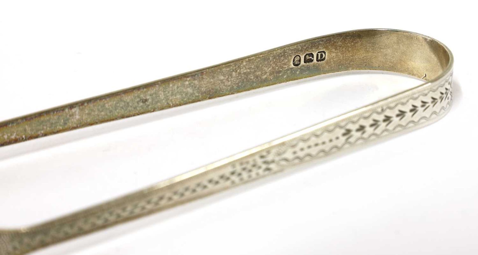 A pair of George III silver sugar tongs, - Image 4 of 33