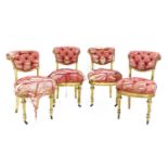 A set of four giltwood single chairs,