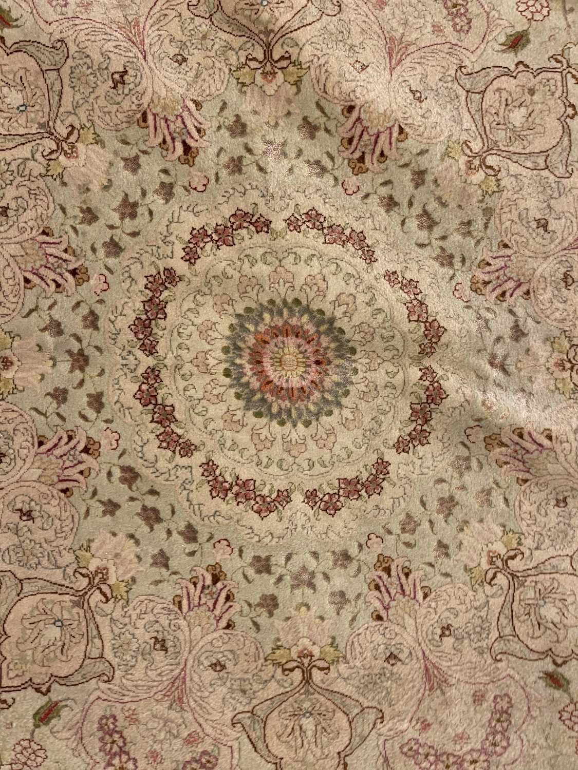 A Persian wool and silk Tabriz rug, - Image 11 of 34