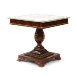 A flame mahogany and parcel-gilt pedestal centre table,