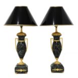 A pair of French serpentine marble urn-form table lamps