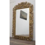 A large 'faux bois' carved, giltwood gesso wall mirror,