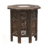 A folding carved hardwood Indian table,