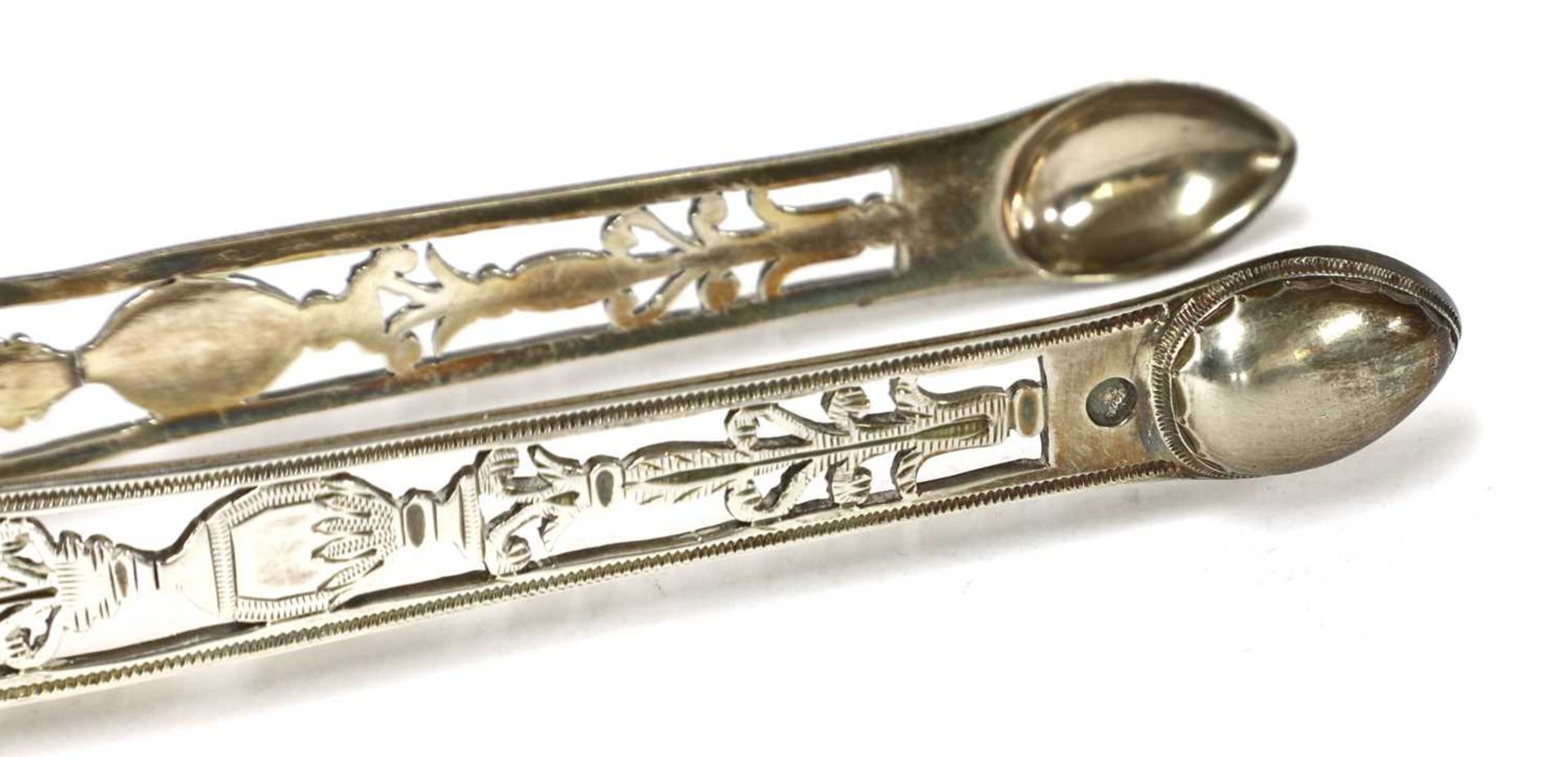 A pair of George III silver sugar tongs, - Image 9 of 28