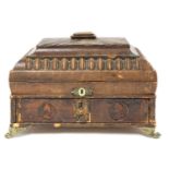 A Regency leather workbox,