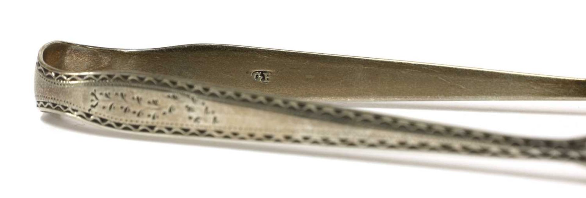 A pair of George III silver sugar tongs, - Image 17 of 33
