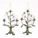 A pair of opaline glass and gilt metal three-light candelabra,