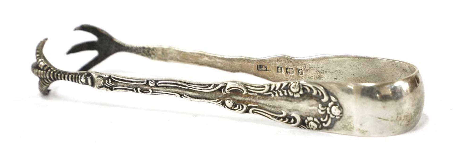 A pair of George III silver sugar tongs, - Image 27 of 28