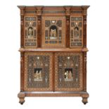 An extraordinary, profusely inlaid, mahogany cabinet,