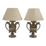 A pair of silver-plated table lamps and shades,