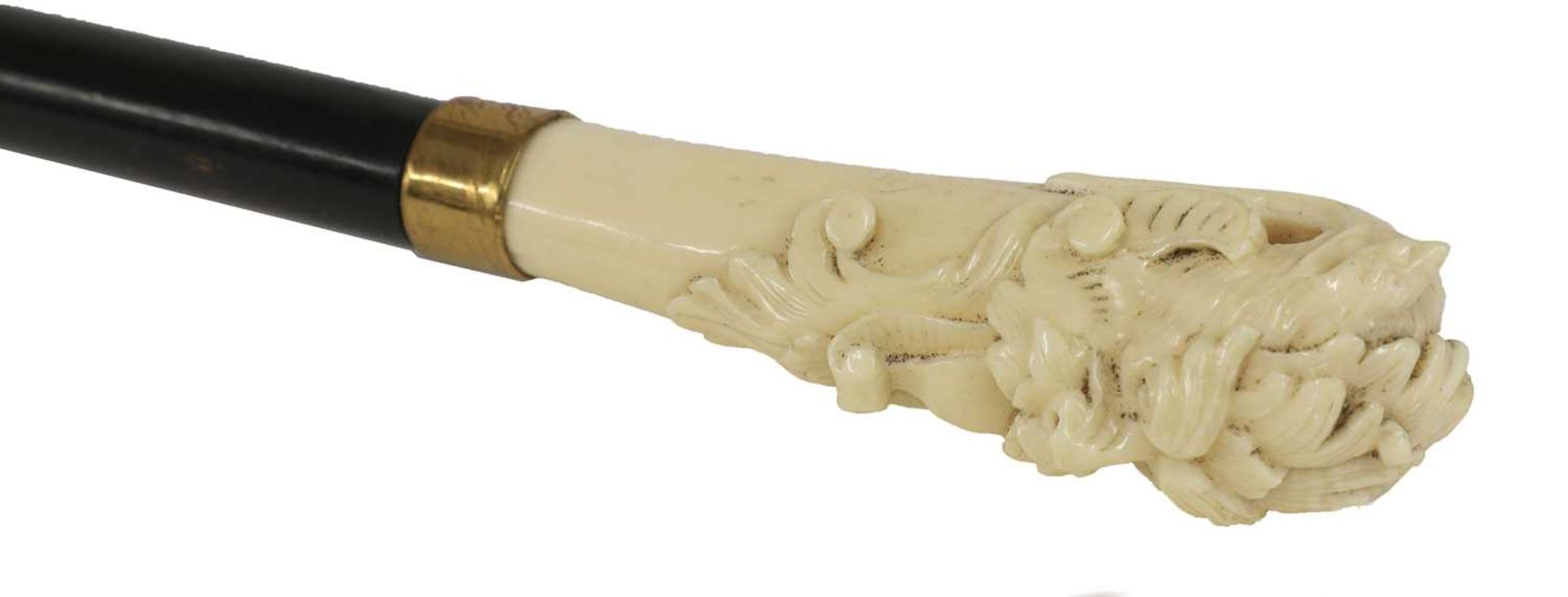 An ivory and ebonised walking stick, - Bild 2 aus 3