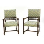 A pair of walnut armchairs,