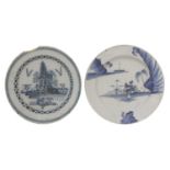 A blue and white delft charger,