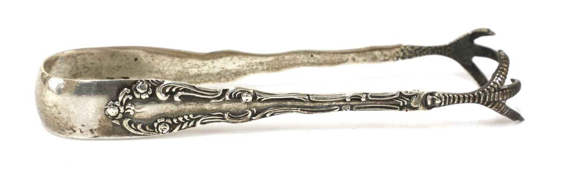 A pair of George III silver sugar tongs, - Image 26 of 28