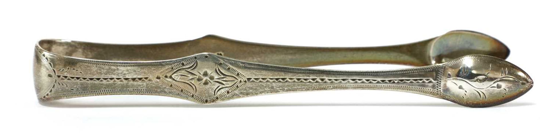 A pair of George III silver sugar tongs, - Image 26 of 33