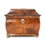 A tortoiseshell tea caddy,