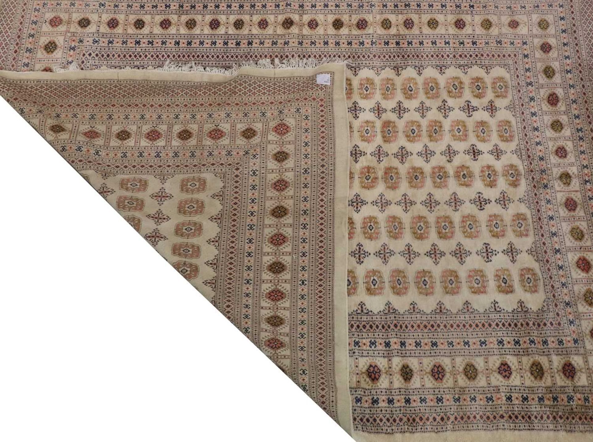 A Bokhara design carpet, - Image 2 of 13