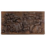 A Black Forest carved oak panel,