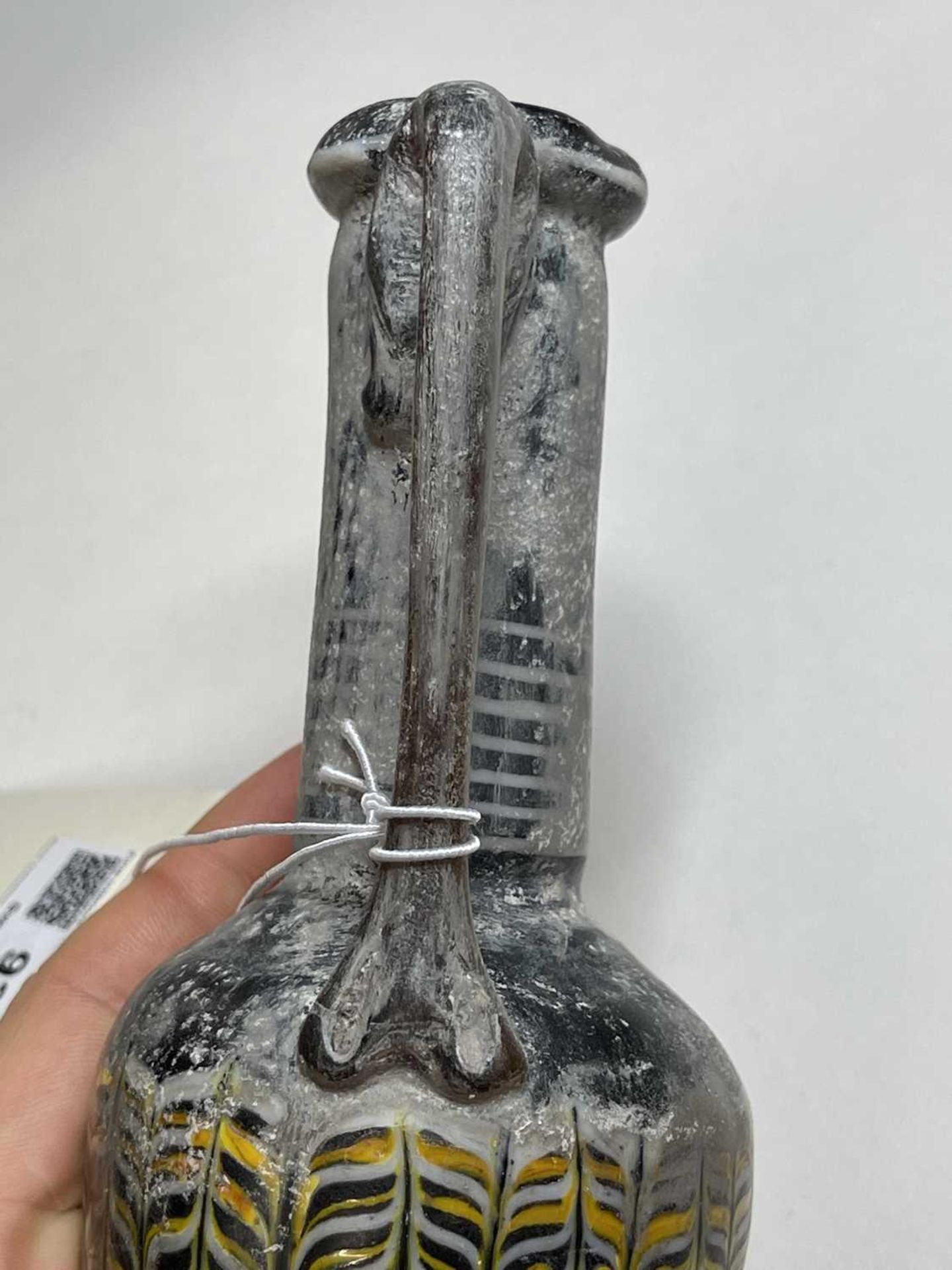 A Roman marbled glass bottle, - Bild 19 aus 49