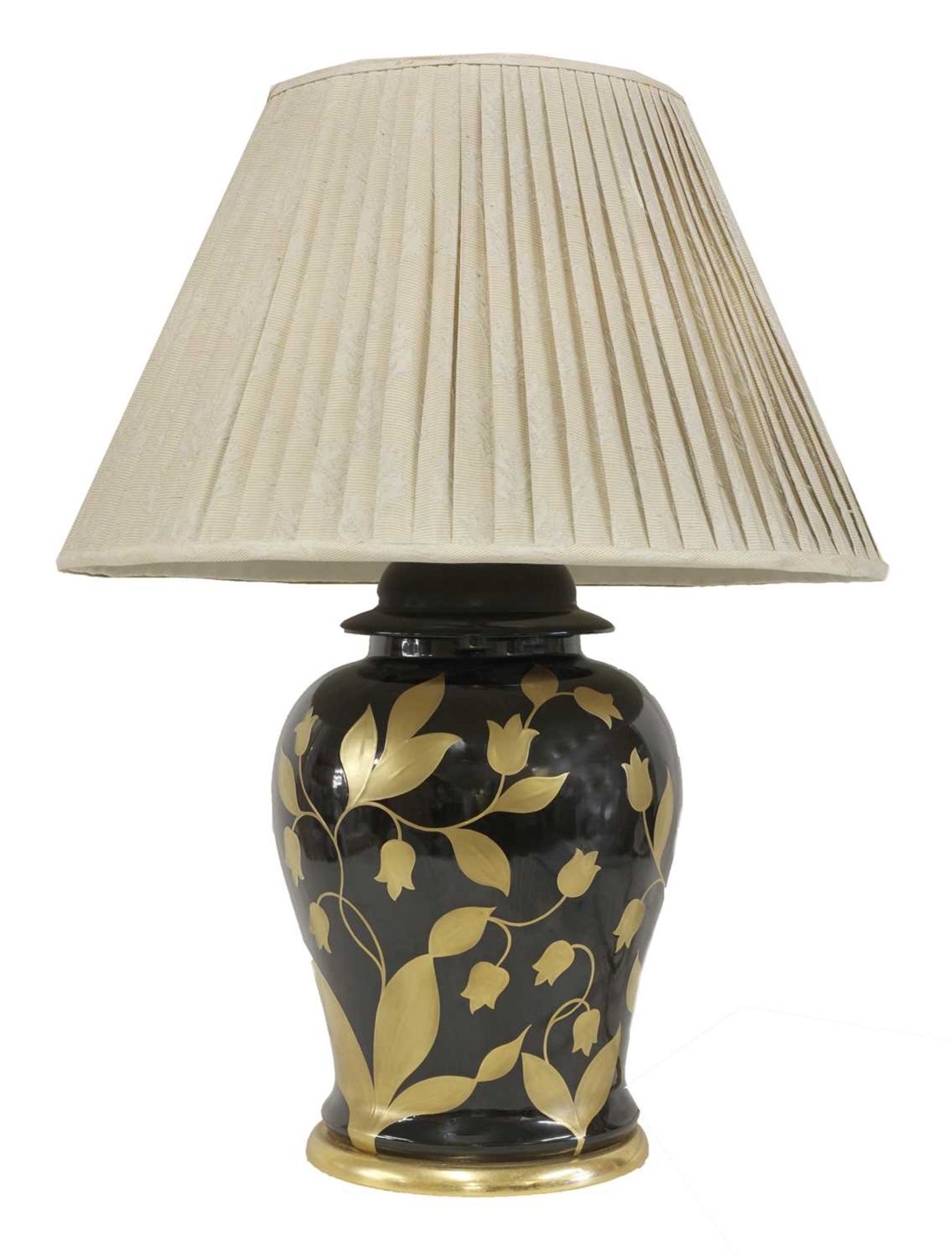 A black and gilt-glazed table lamp,