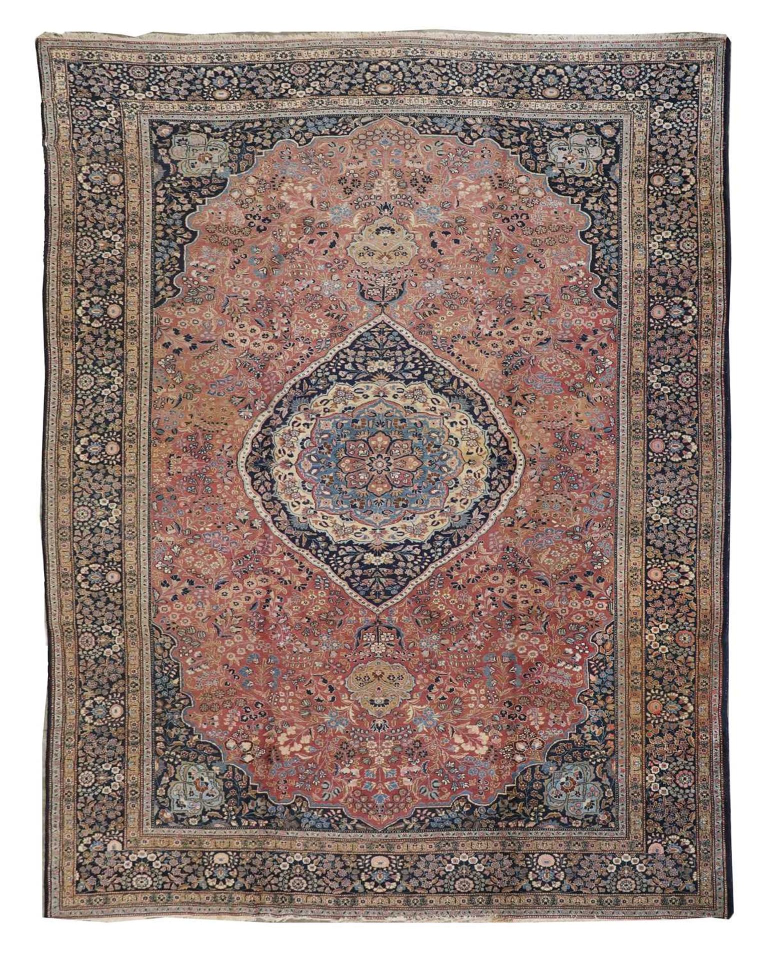 A large Persian Mashad carpet,