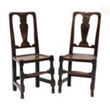 A pair of George I elm side chairs,