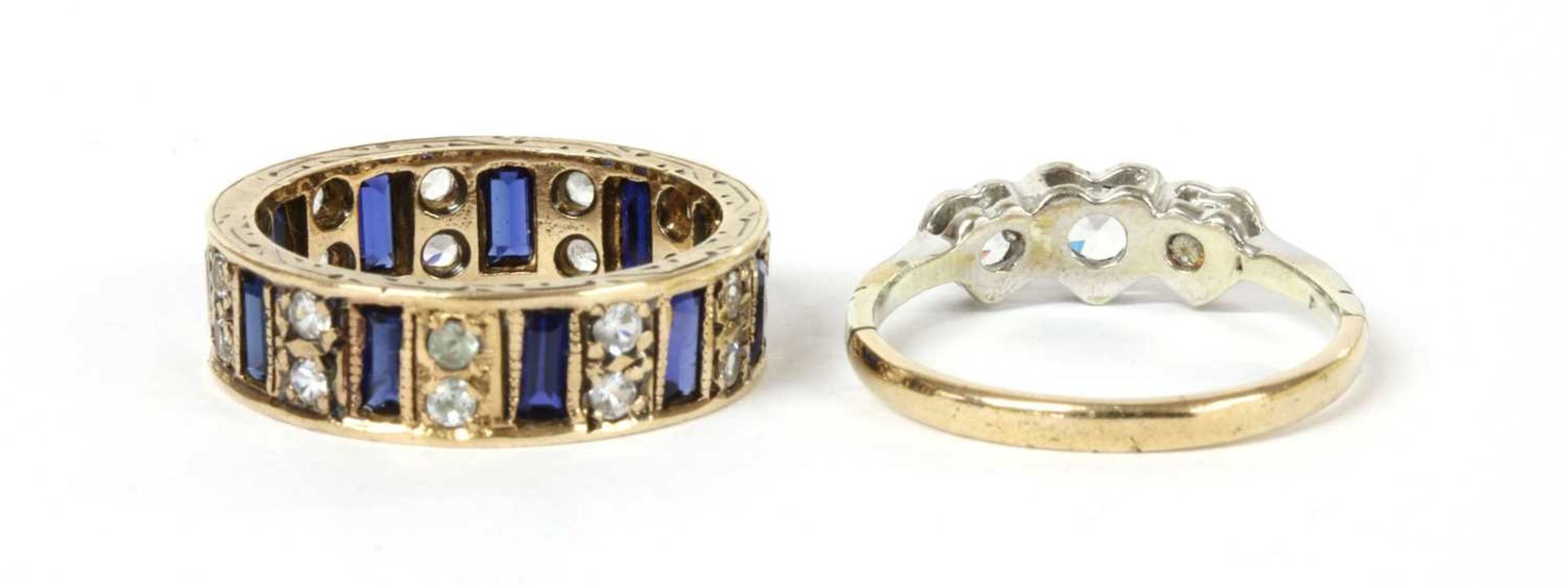 A 9ct gold blue and white paste full eternity ring, - Image 2 of 2