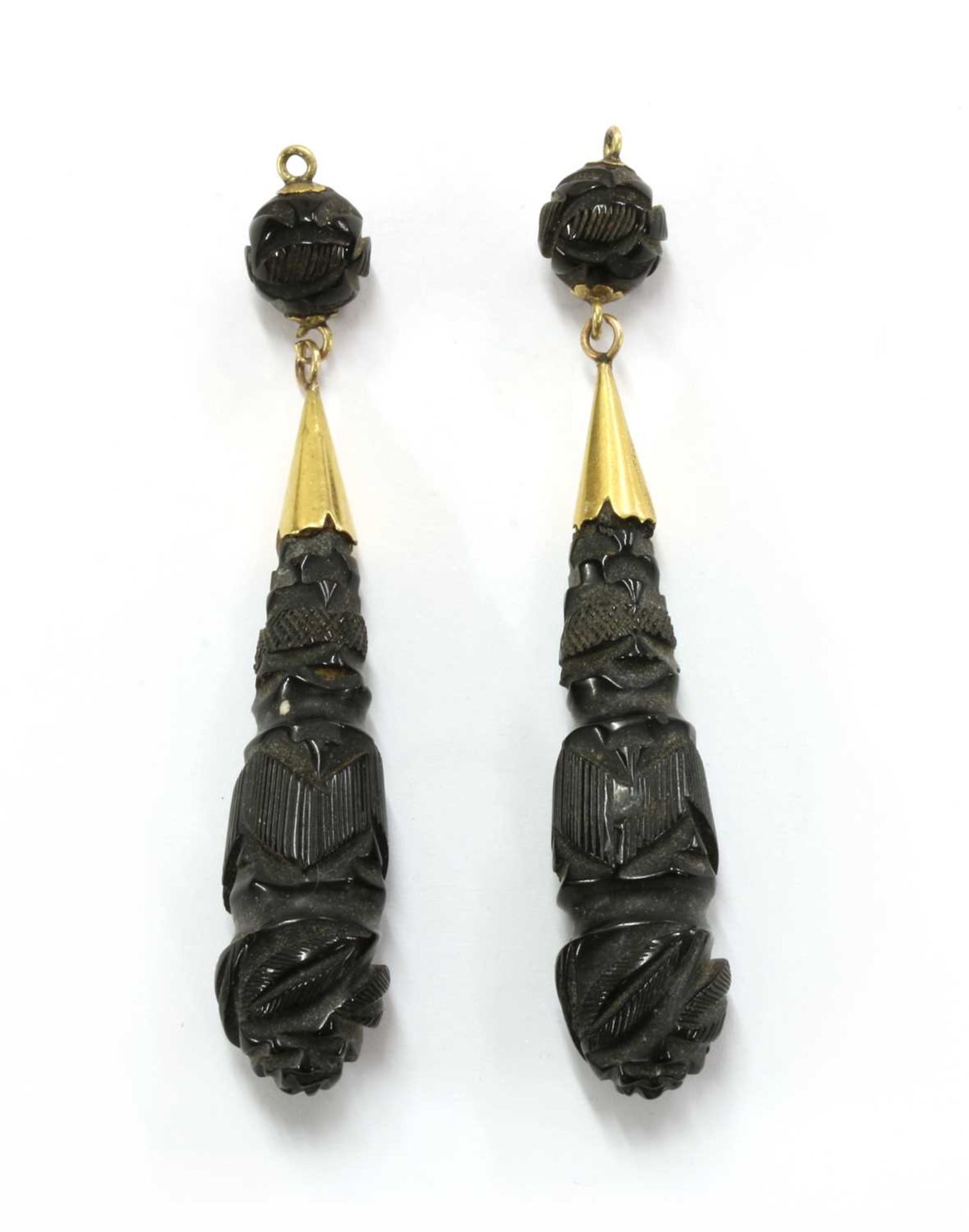 A pair of carved jet drop earrings,