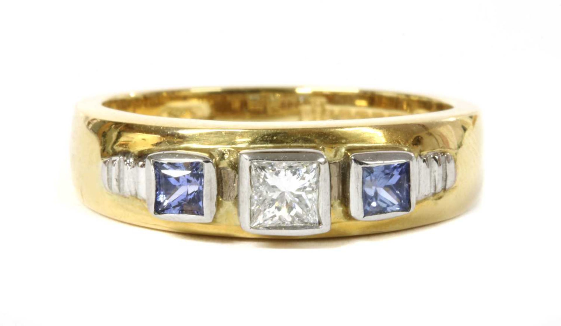 An 18ct gold diamond and tanzanite ring, by Clogau,