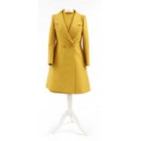 A vintage Louis Feraud mustard dress and coat