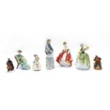 A collection of ceramic figures,