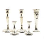 A pair of silver candlesticks,