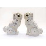 A pair of 19th Century Staffordshire dogs,