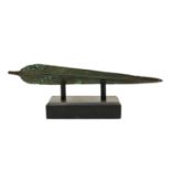 A Luristan bronze sword on stand