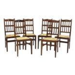 A set of six walnut dining chairs,