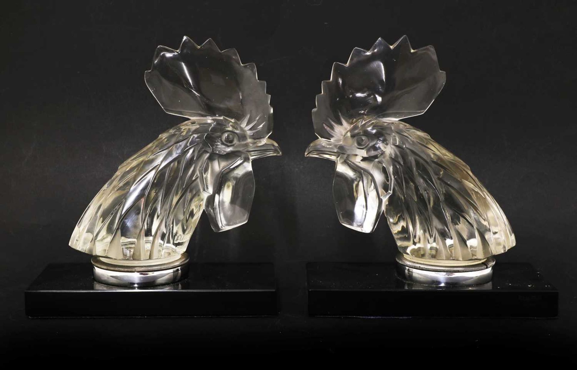 A pair of Lalique 'Tete de Coq' car mascots,