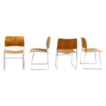A set of six modern stacking chairs,