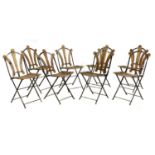 A set of eight French folding bistro or garden chairs,