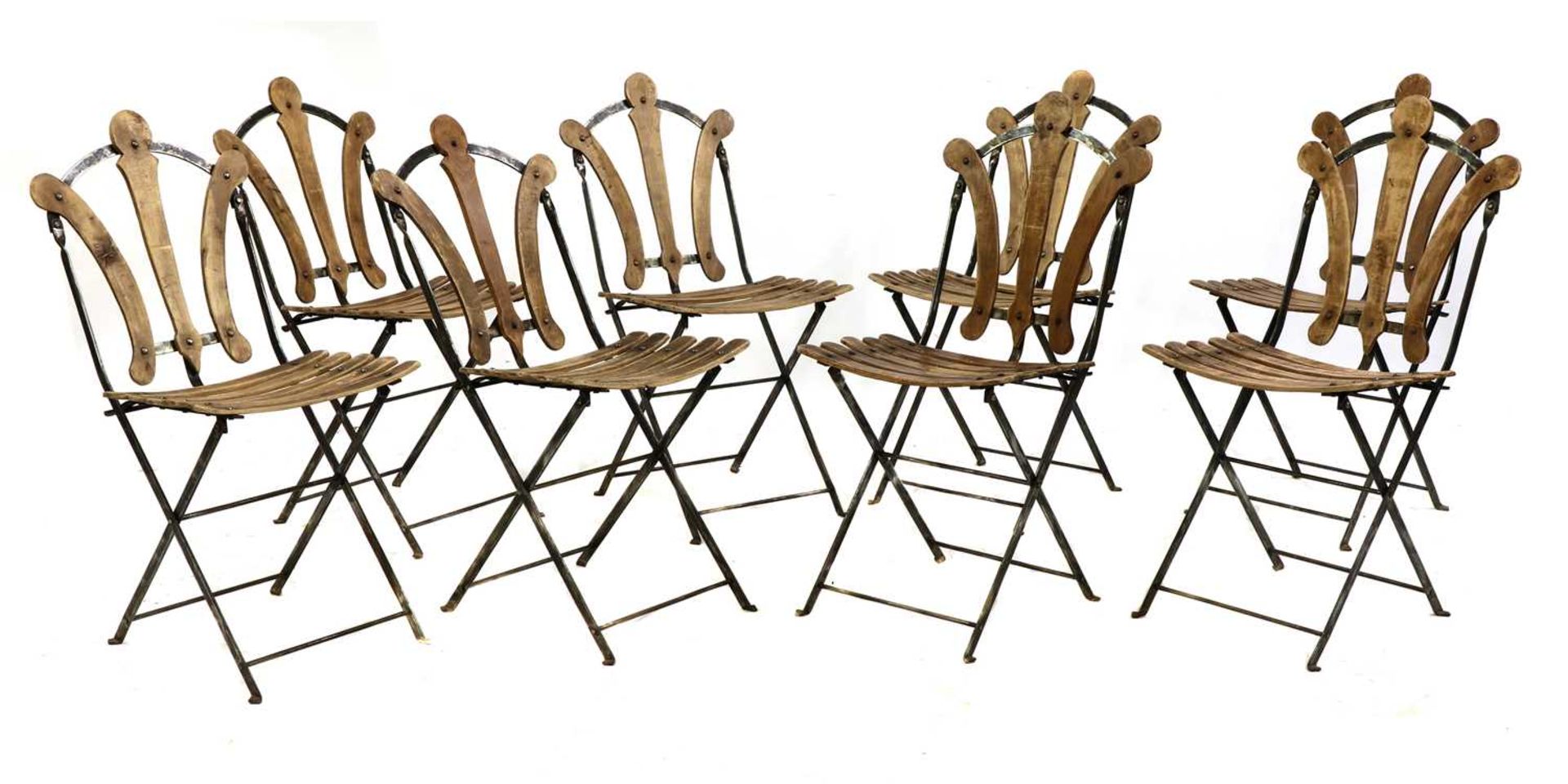 A set of eight French folding bistro or garden chairs,