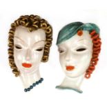 Two Goldscheider pottery wall masks,