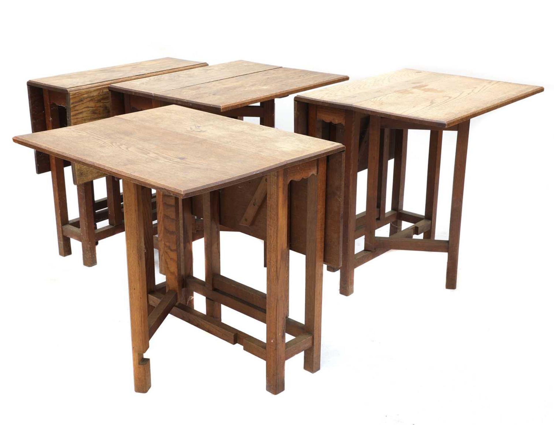 Four Cotswold oak gateleg tables,