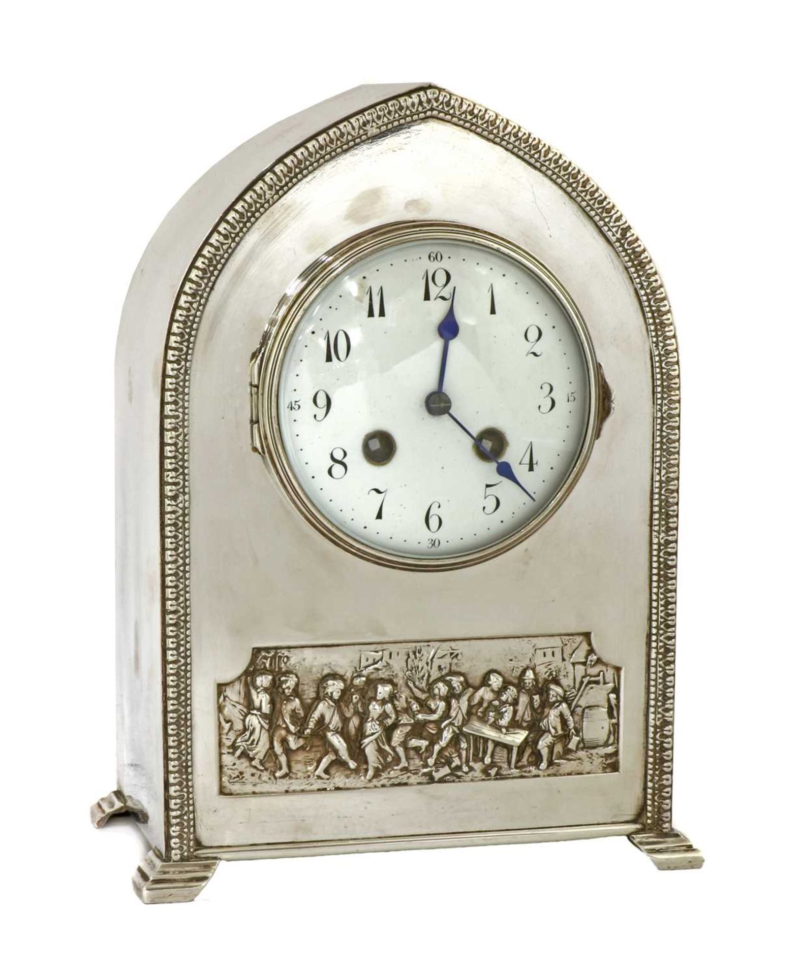 An Arts and Crafts silvered mantel clock,