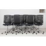 Ten Vitra Meda desk chairs,