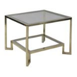 A modern chrome and brass low side table,
