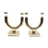A pair of unusual brass 'U' shaped table lamps,