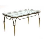 A French brass coffee table,