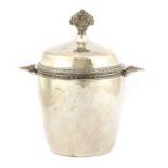 An Arts and Crafts silver-plated tea caddy,