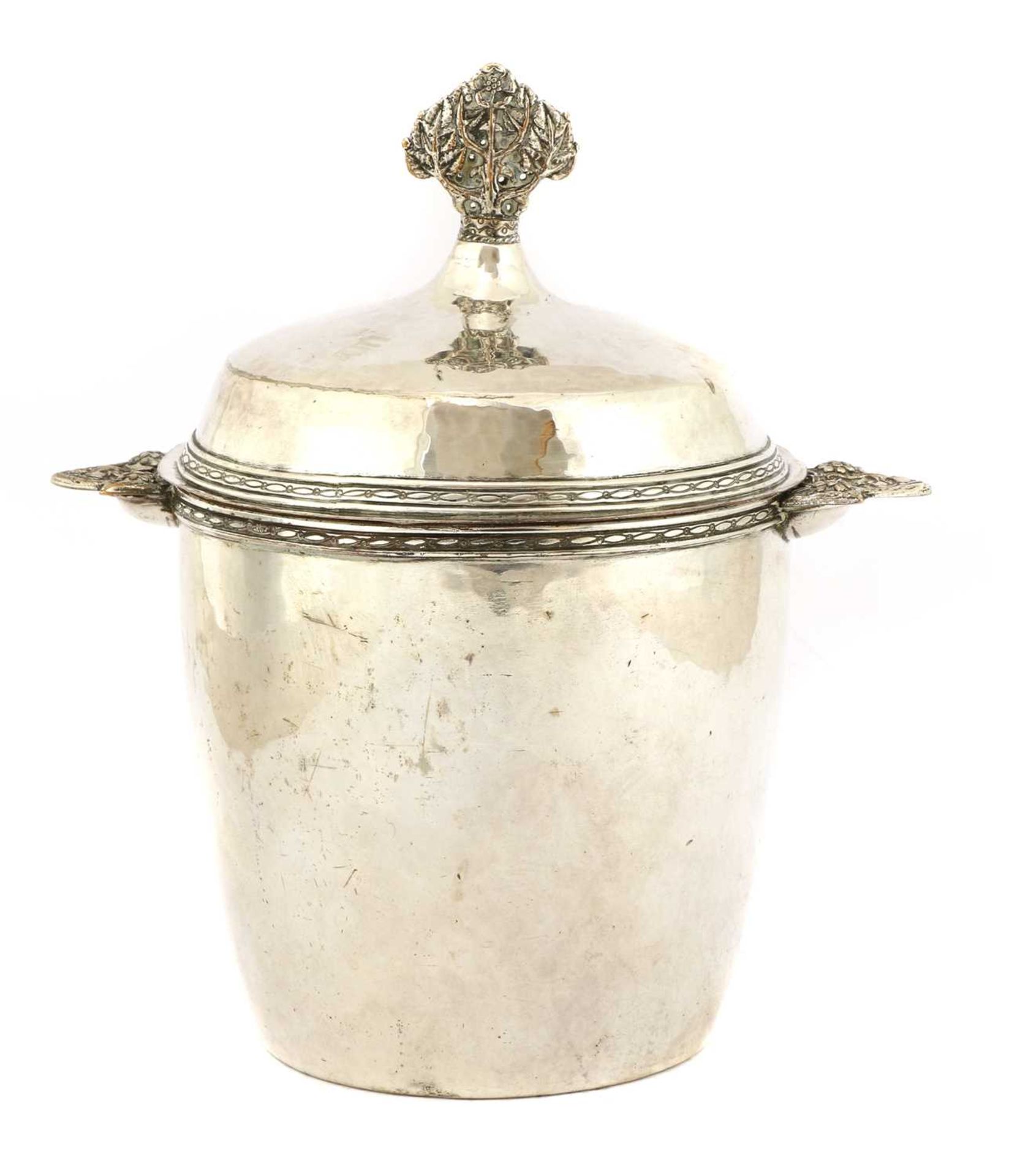 An Arts and Crafts silver-plated tea caddy,