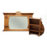 An Arts and Craft oak wall mirror,