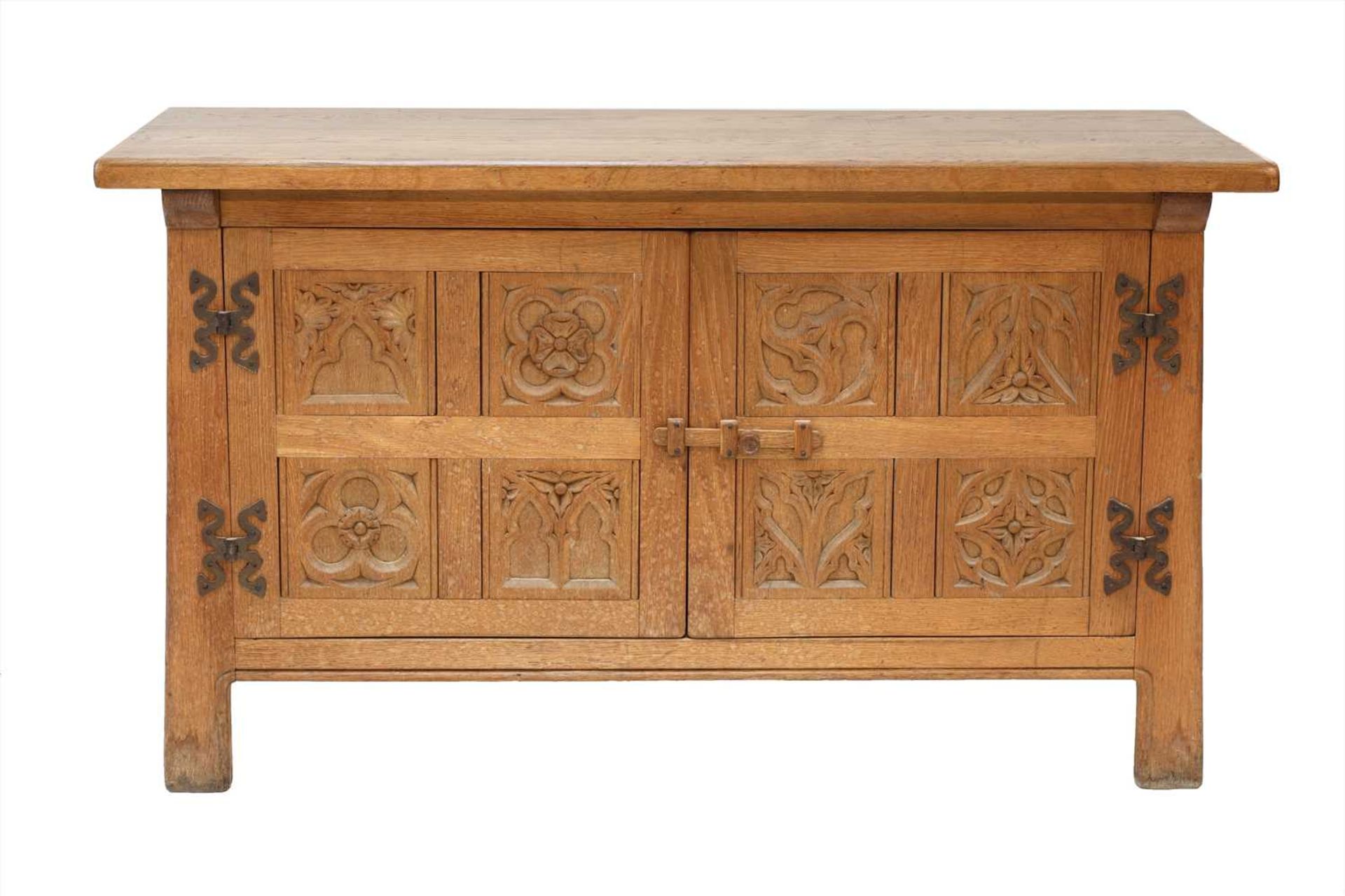 An Arts and Crafts oak sideboard,